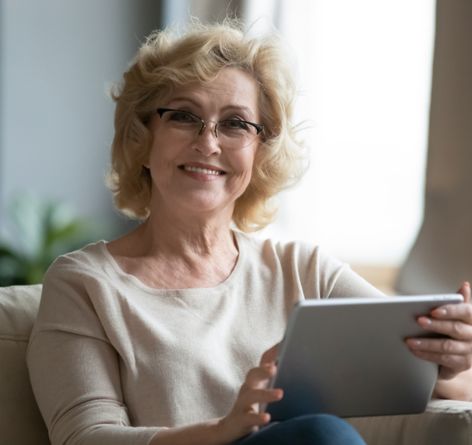 Senior woman using iPad