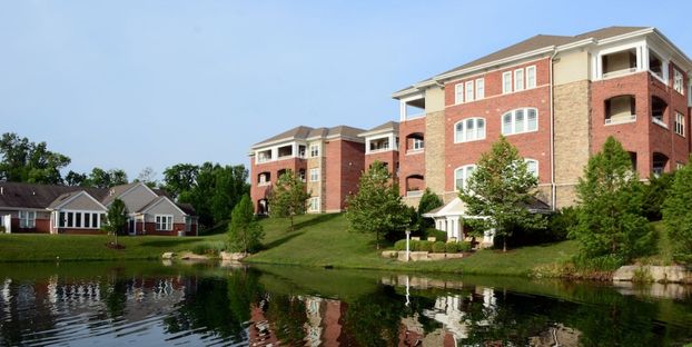 Exterior view of Twin Lakes community with lakefront