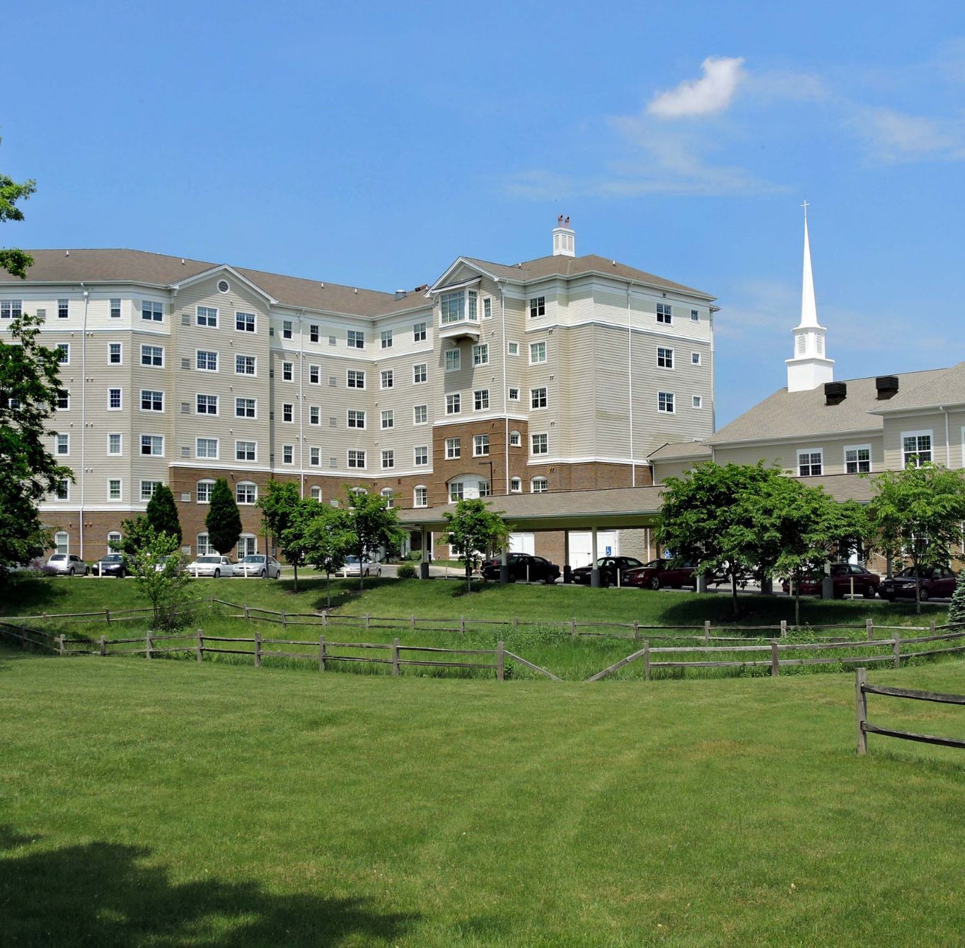 Exterior view of Wesley Ridge campus surrounded by landscaping